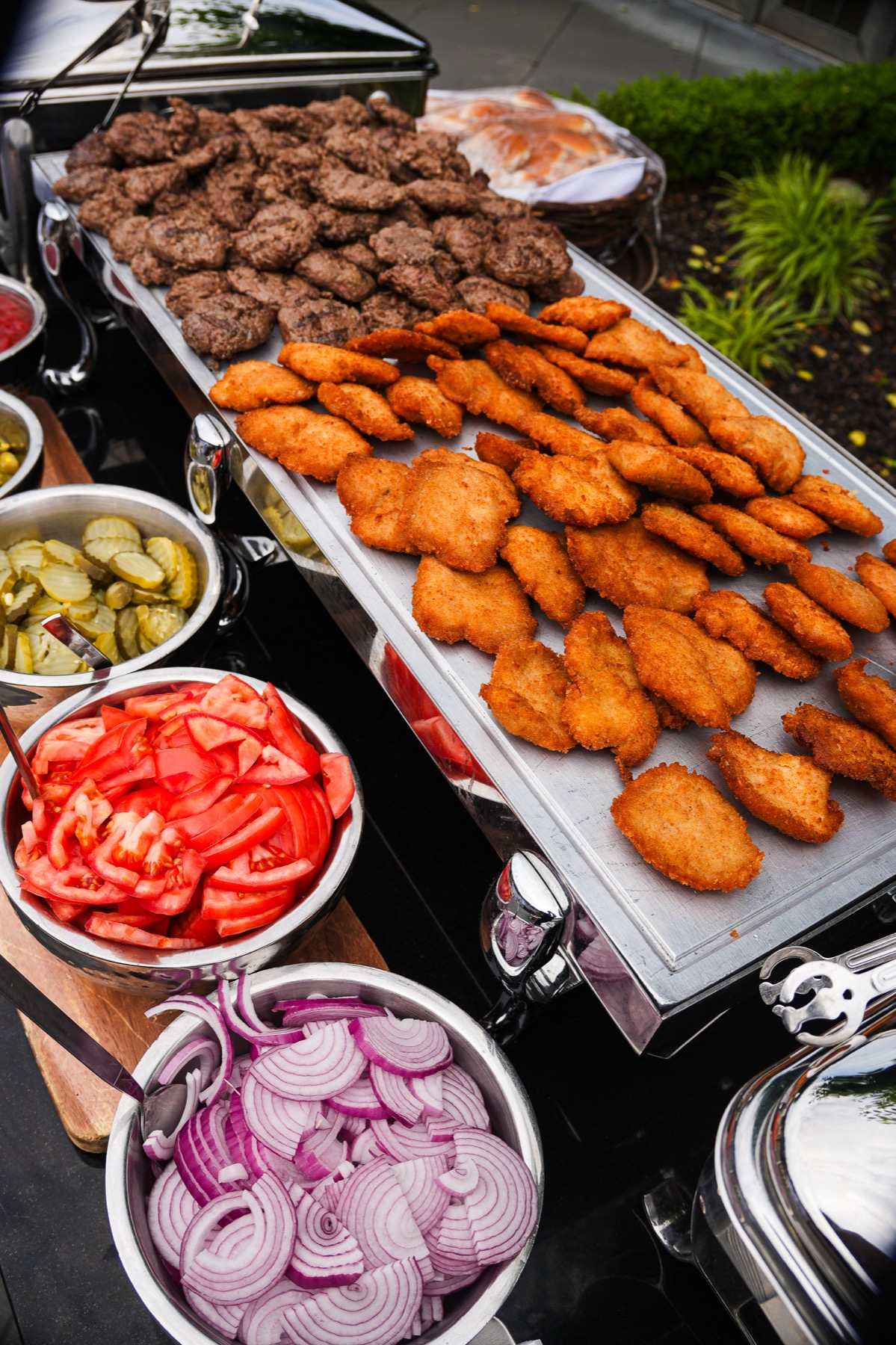 Outdoor schnitzel and slider station during an event