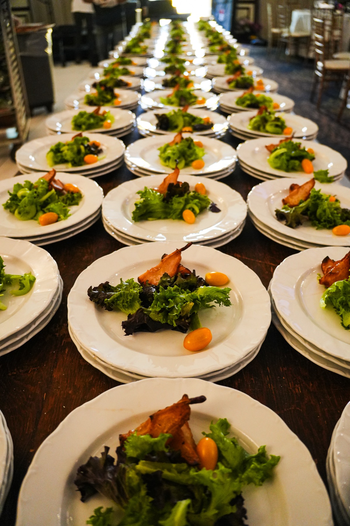 Rows of plated kosher salads ready for service