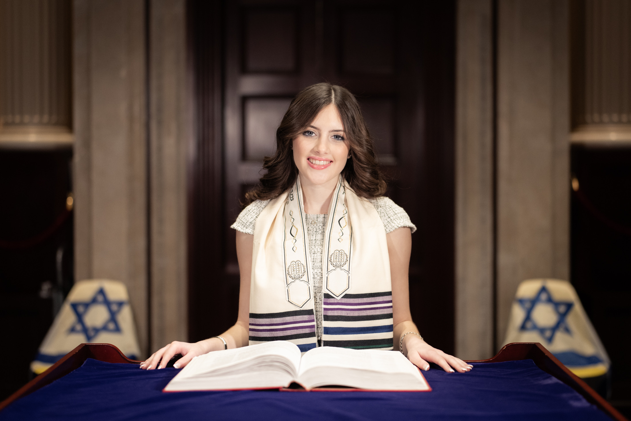 Bat mitzvah portrait at the open Torah