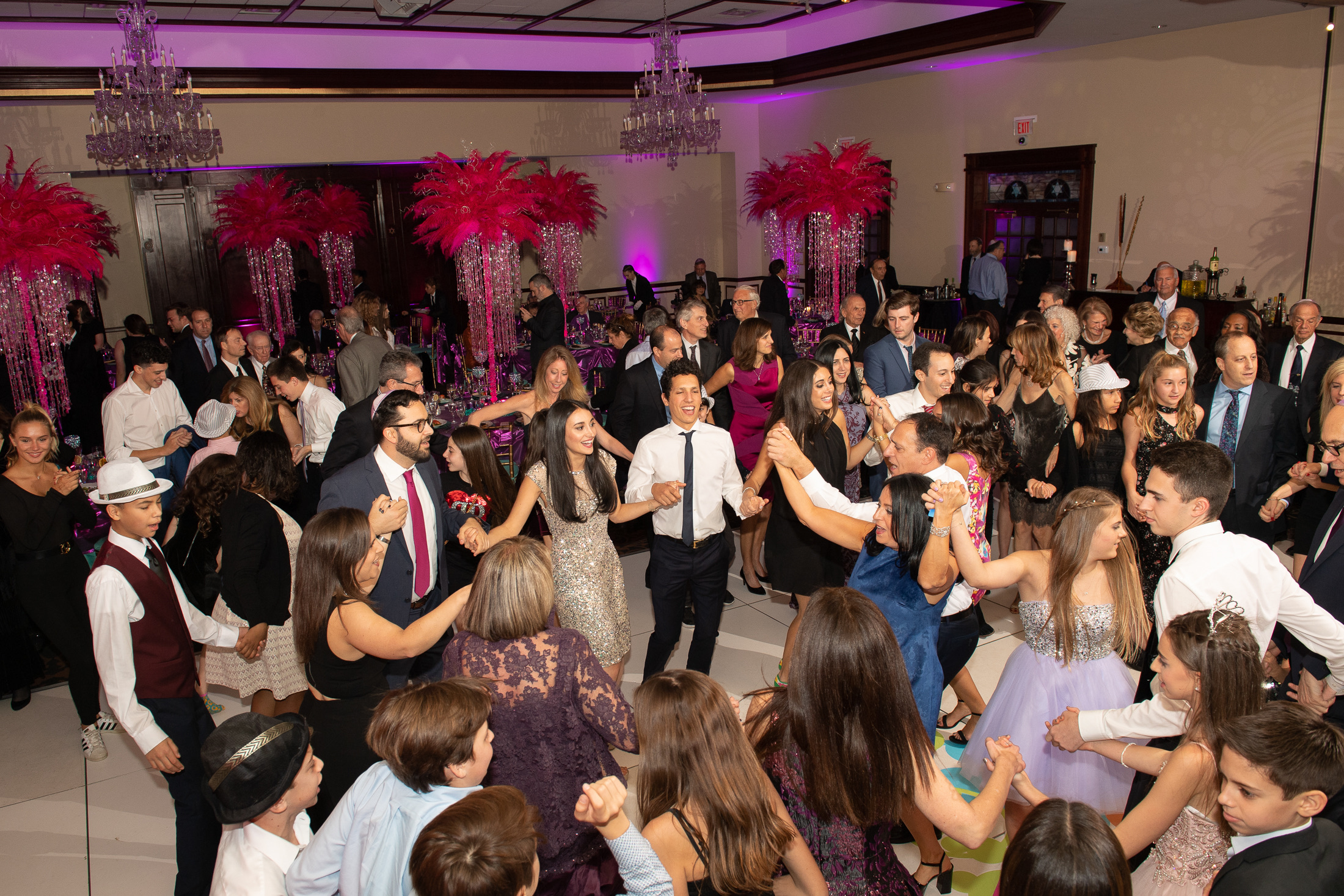 Family and friends filling the dance floor during a mitzvah celebration