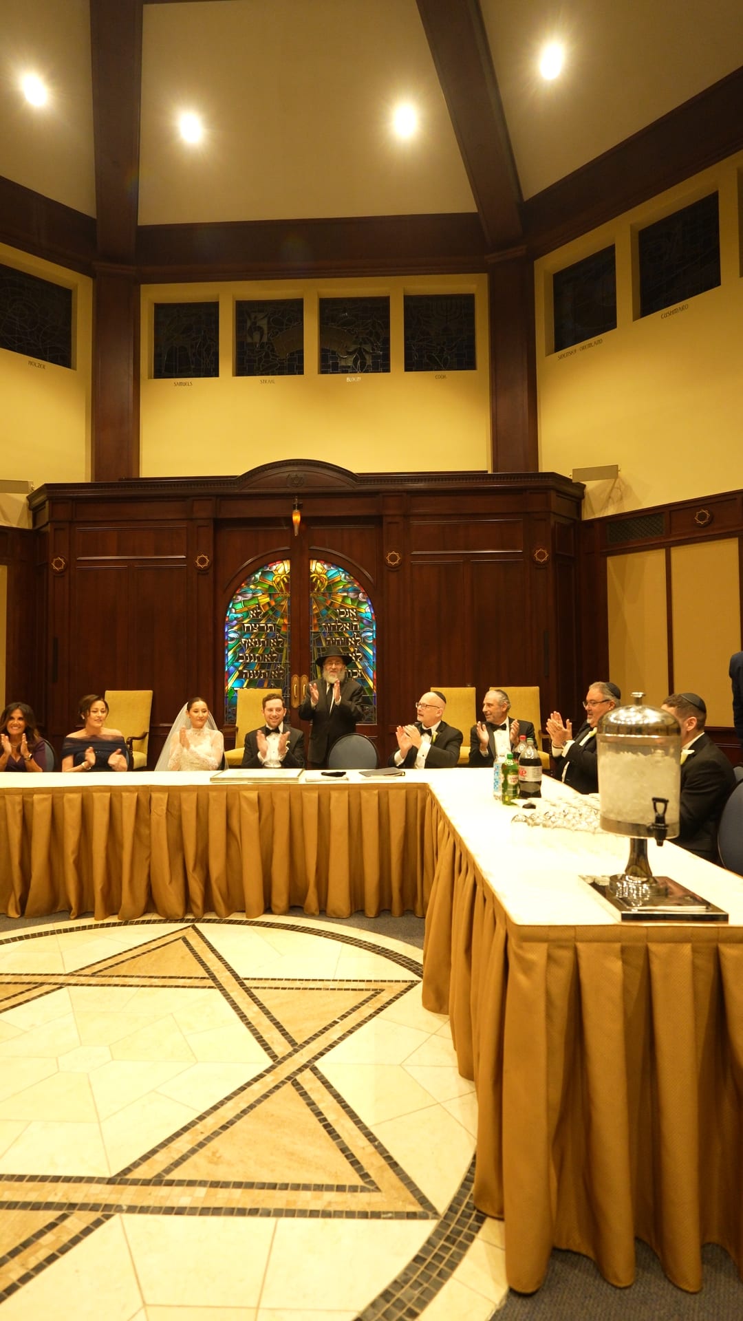 Tisch room with family gathered around the table